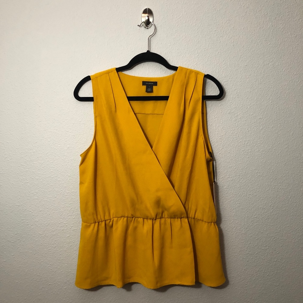 Sleeveless Peplum Blouse